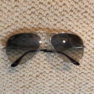 Ray Ban grey tinted aviator sunglasses.